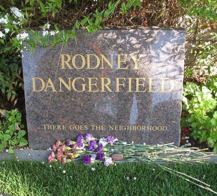 The headstone of Rodney Dangerfield with "There goes the neighbourhood."