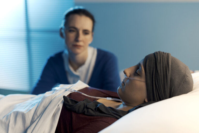 Caring Woman Assisting Her Friend With Cancer